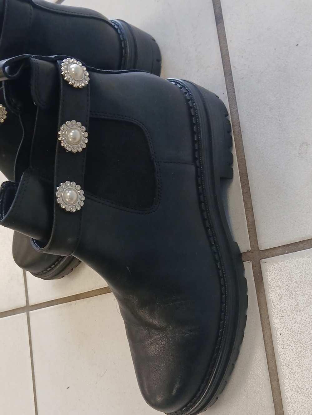 Copper Key Black Ankle Boots with Pearl-Trim Strap